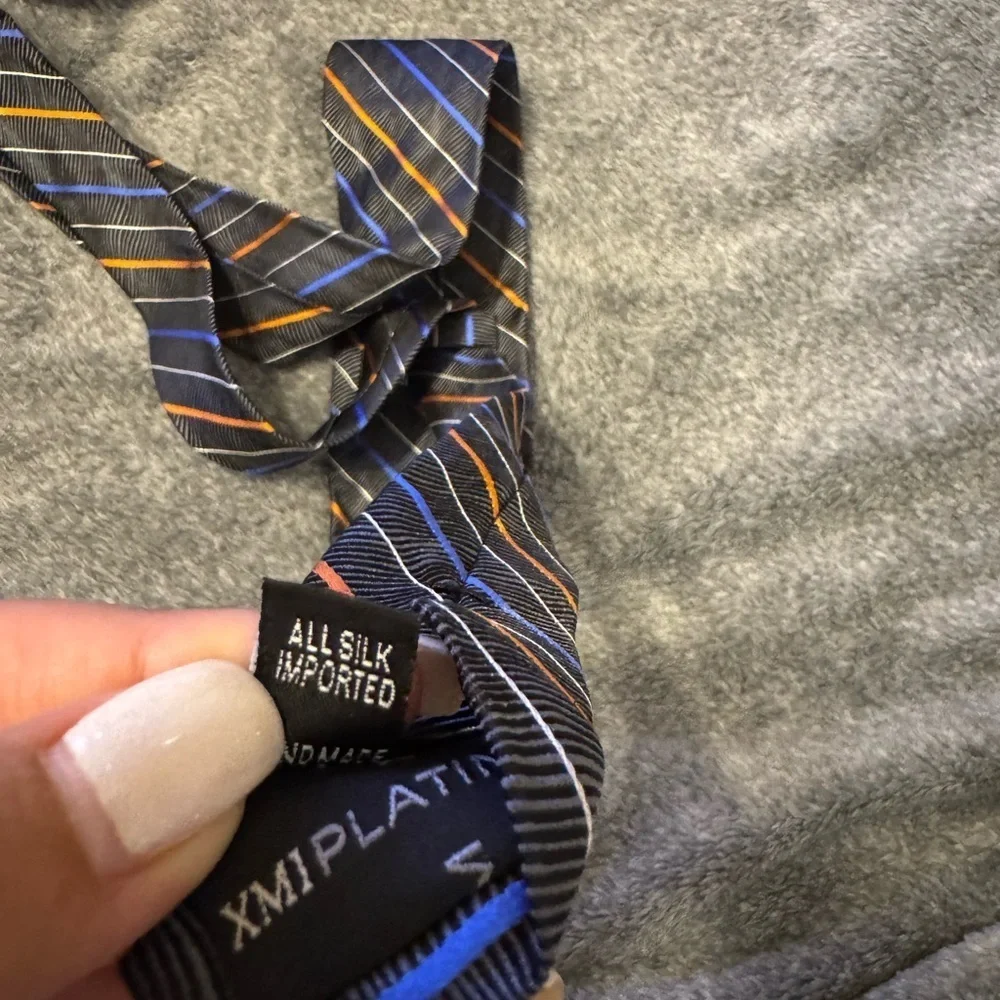 XMI Platinum 100% Silk Striped Black Tie with Orange and Blue Accents - Picture 4 of 4